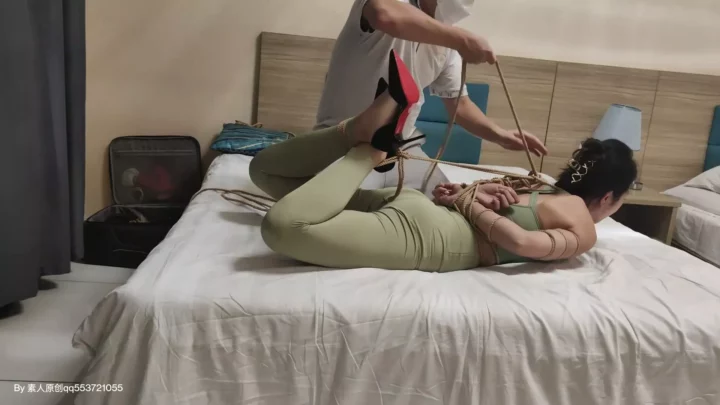 Screenshot 1 from Stunning Asian Model Endures Intense Hogtie Bondage