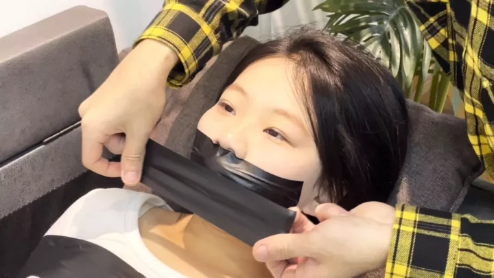 Screenshot 1 from Bound Art Records: Innocent R’s First Tape Gag Bondage